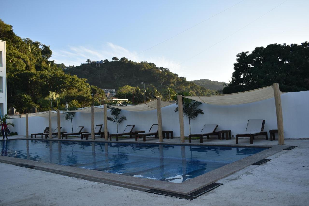 Malaki Hotel Los Ayala Bagian luar foto