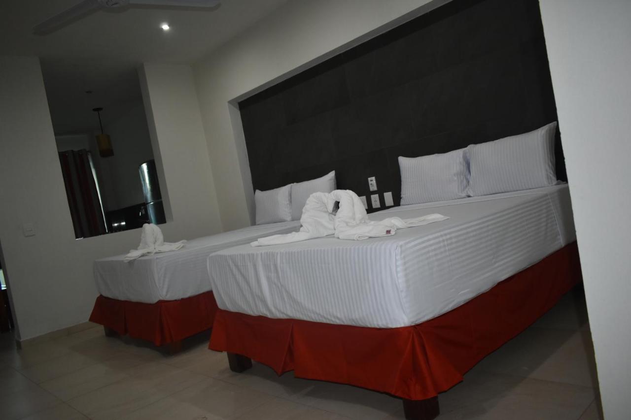 Malaki Hotel Los Ayala Bagian luar foto