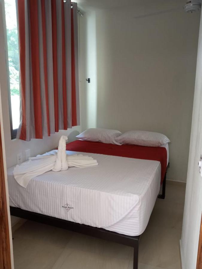 Malaki Hotel Los Ayala Bagian luar foto